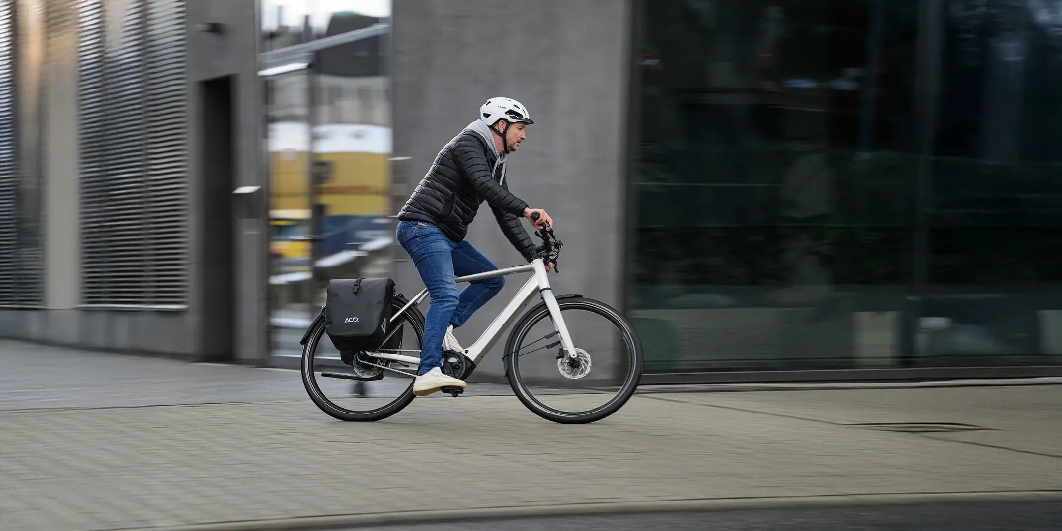 Man commuting to work on a cube editor electric bike